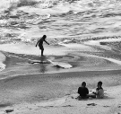 three boys on a beach 